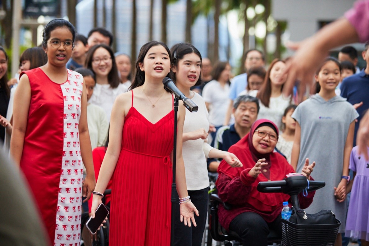 Flash mob singing 'Our Story'