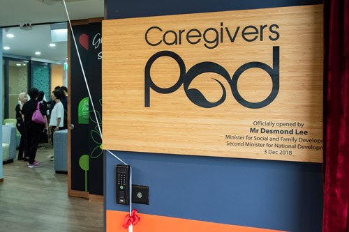 A wooden sign at the entrance of Caregivers Pod, which was officially opened by Mr Desmond Lee on 3 Dec 2018.