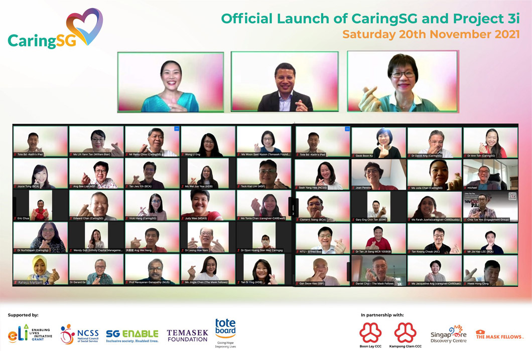 Zoom group photo taken during the official launch of CaringSG and Project 3i. Then Minister of Social and Family Development, Mr Desmond Lee, is pictured in the middle of the photo, while the logos of supporting and partnering organisations are below.