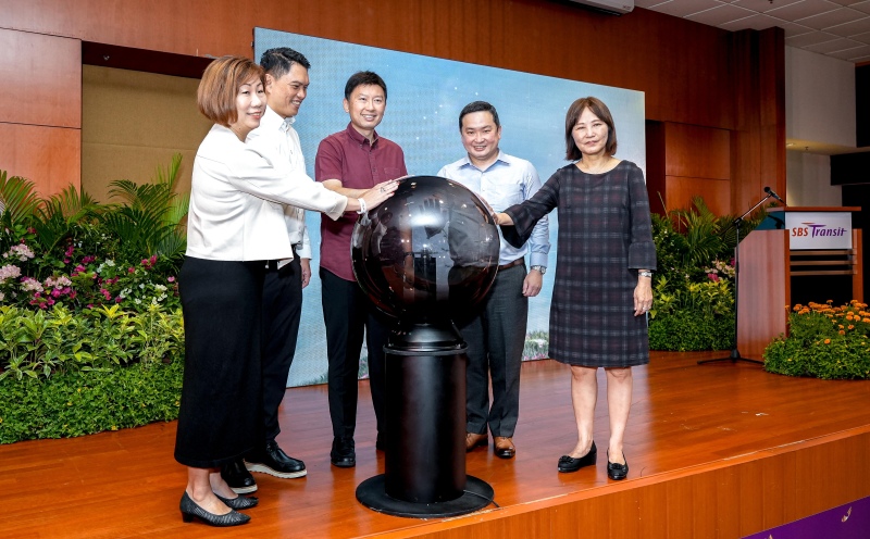 Launch of EPP_Timeline A group of 5 people with their hands on a plasma ball.