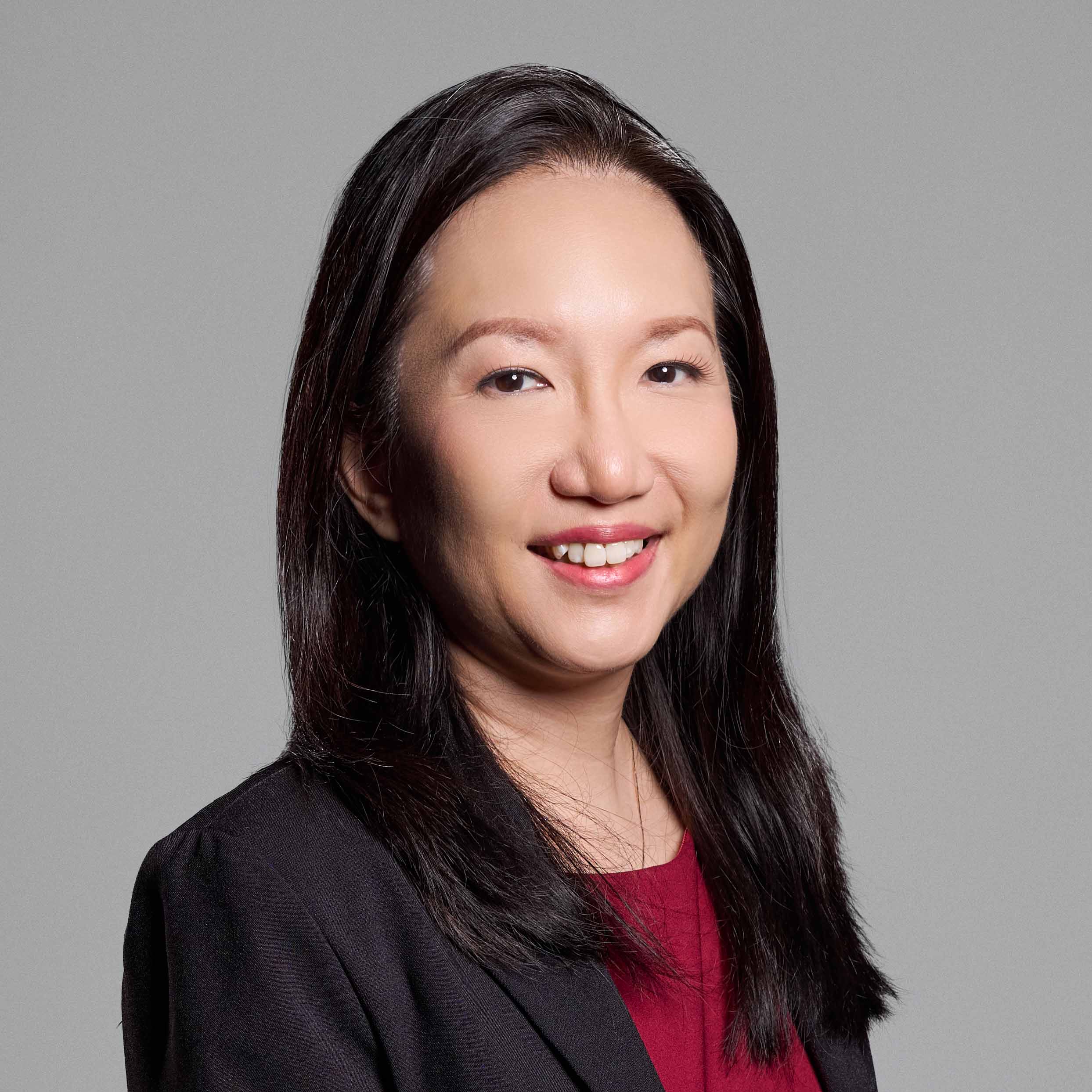 Headshot of Ms Sheralyn Tan, Director of Service Administration