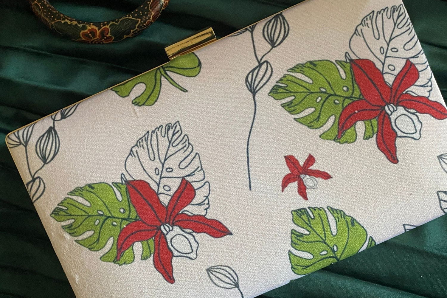 Box clutch with floral design