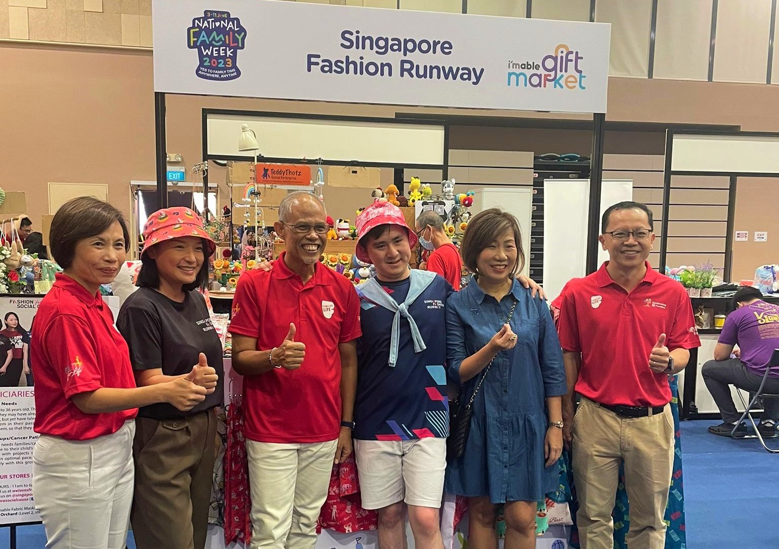 Group photo of Ms Ong Ai Hua, Ms Eileen Yap, Mr Masagos Zulkifli, Mr Vuitton, Ms Ku Geok Boon, and Mr Aubeck Kam