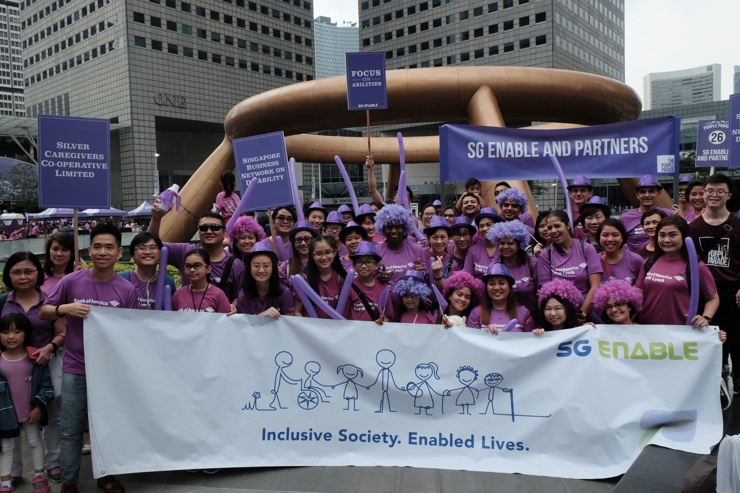 Image of SG Enable staff and partners at the physical Purple Parade held at Suntec in 2018