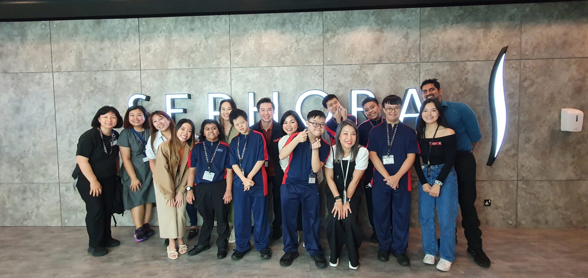 Group photo of students and staff from Sephora