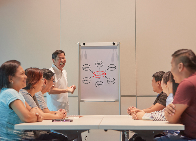 A group of professionals having a brainstorming session together.