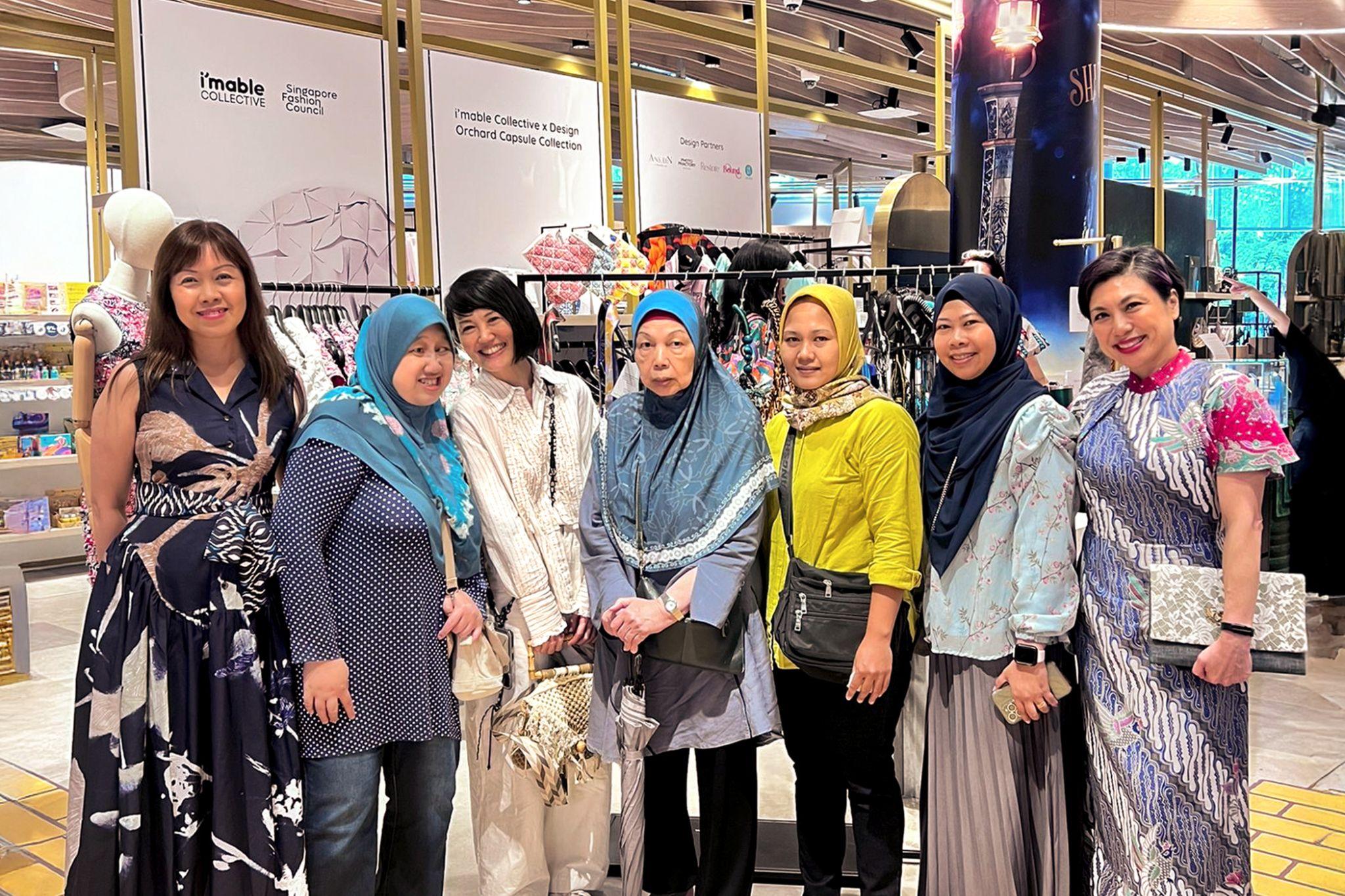 group of individuals posing for a group photo