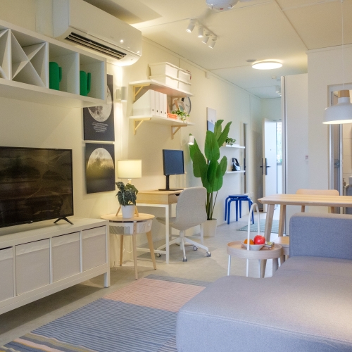 Photo of the living room area in the simulated 4-room HDB layout of ILS.