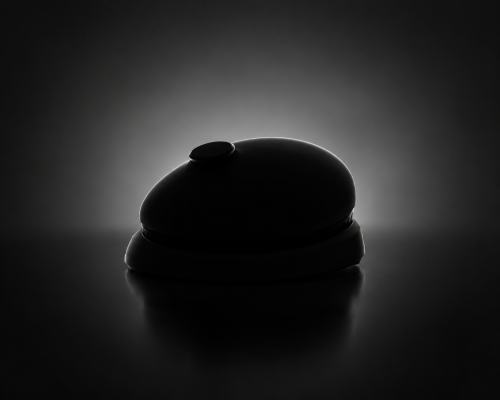 Silhouette of a round device.