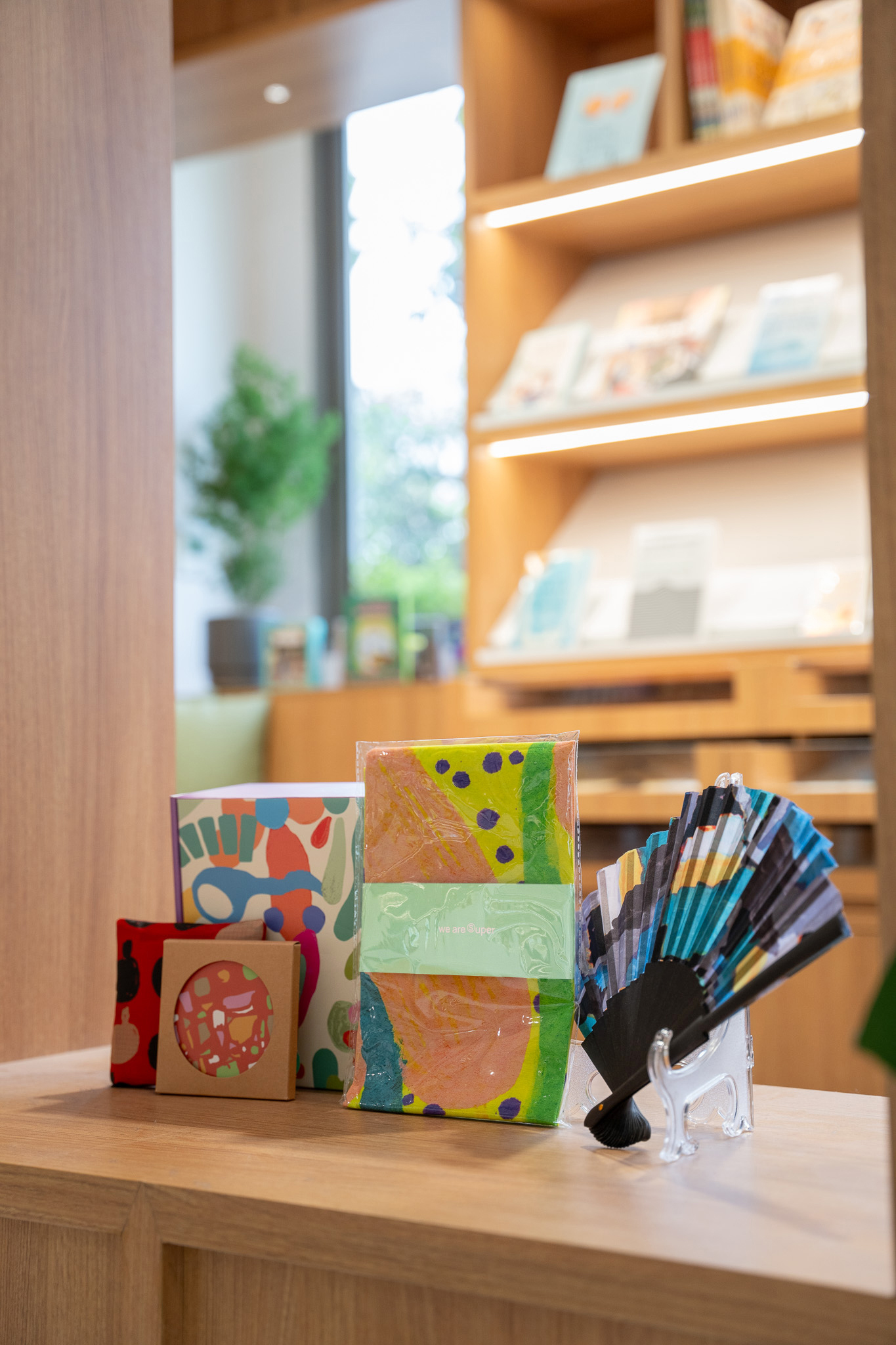A few colourful products featuring custom artwork on display.